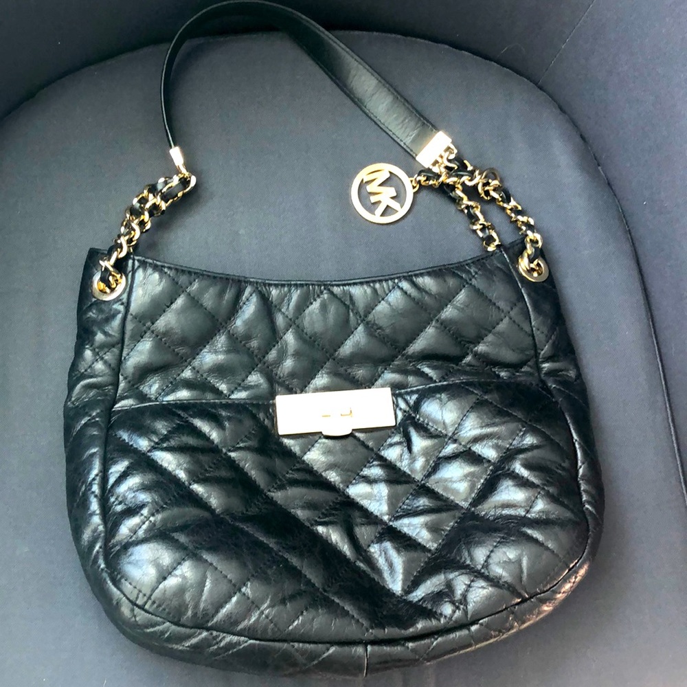 Michael Kors black bag with pockets and 2 compartments